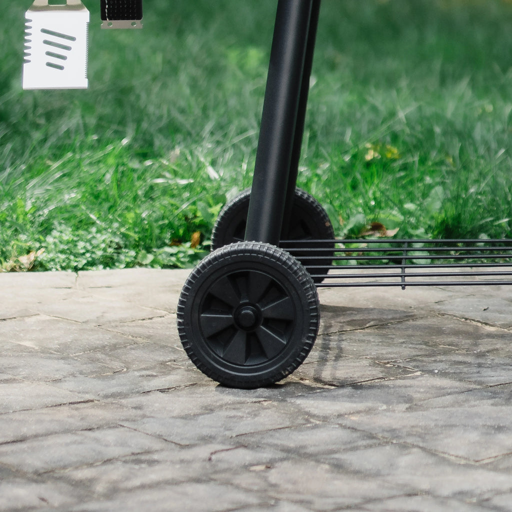 Closeup of the wheels on the left side of the cart