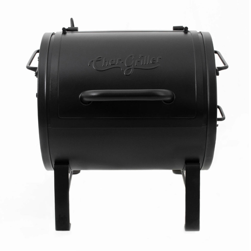 Small black barrel-style grill with 4 short legs, 1 handle on the left side, 2 handles on the right side, and one larger handle across the front of the lid. The lid is stamped with an embossed Char-Griller logo.